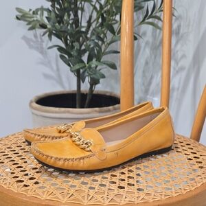 Stuart Weitzman Mustard Patent Leather Loafers with Gold Chain